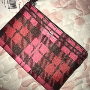 pink plaid Coach wristlet